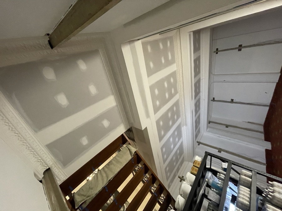 Ornate cornice matched to the original