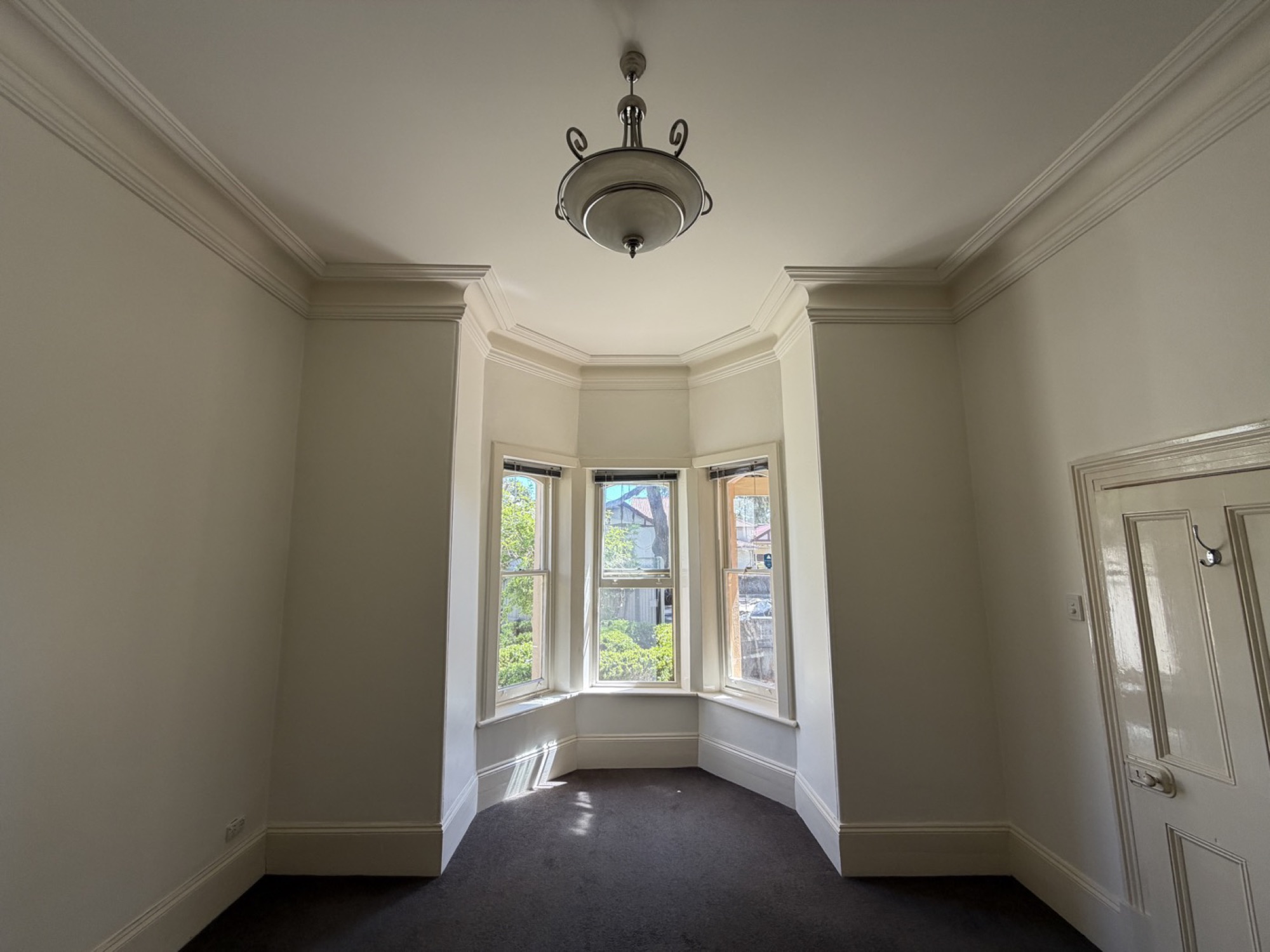 Painted panelled ceiling with beaded cornice