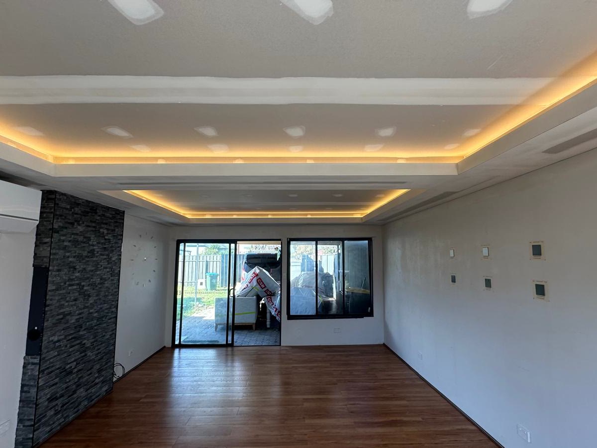 Living room, new coffered ceiling framed up and lined