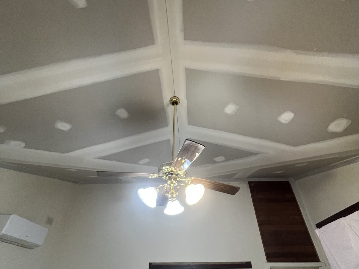 Bedroom with raked ceiling and cornice